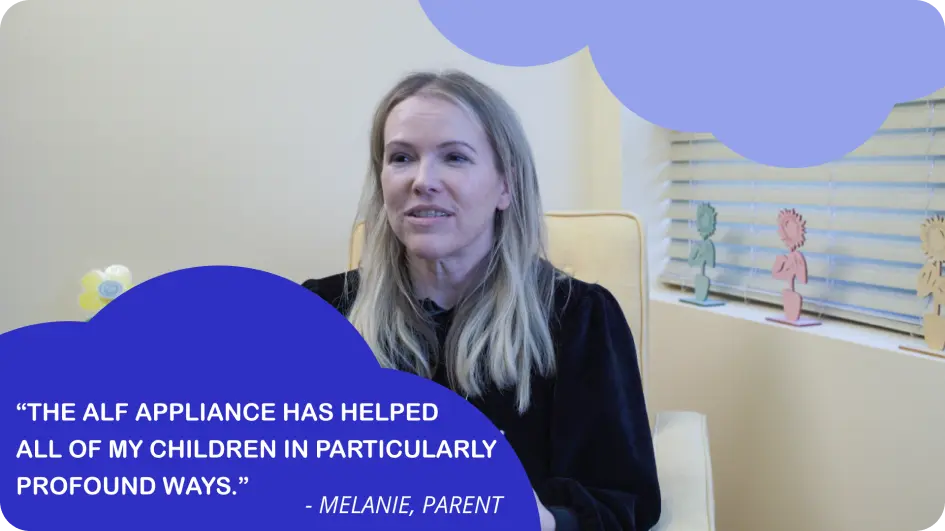 A woman sitting in front of a microphone with a quote overlay on a video call screen.