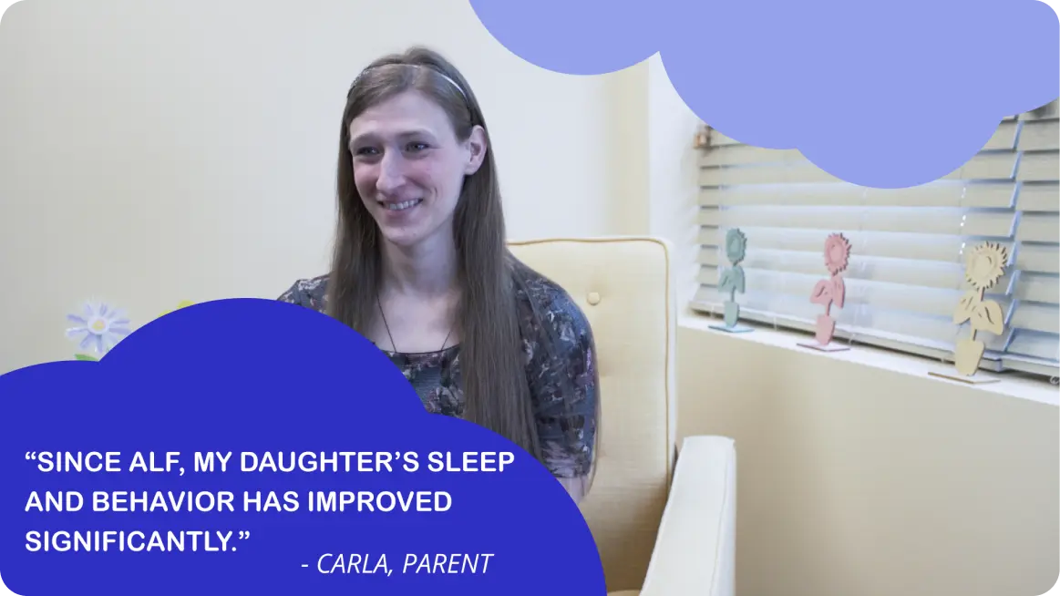 The image shows a person sitting at a desk with a quote overlaid on the screen behind them.